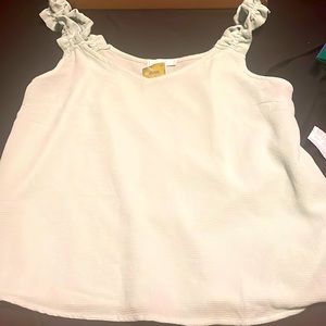 Light blue sheer tank top.